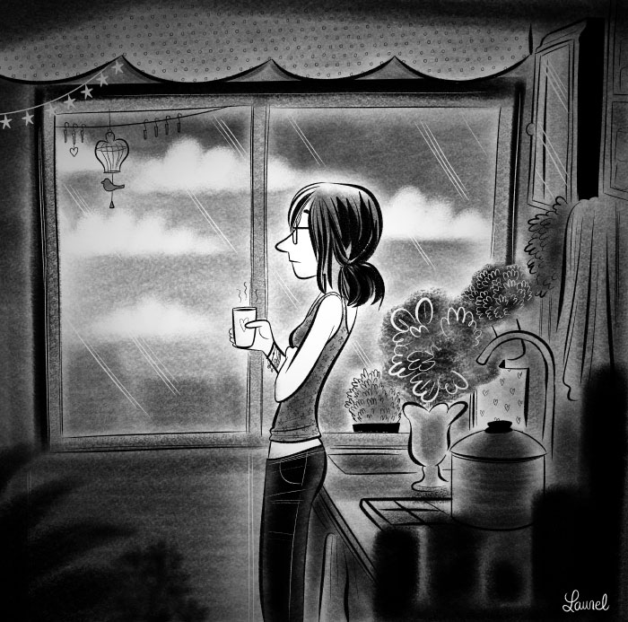 Mon amie Cécilia, qui boit un café dans sa cuisine, à Metz. 